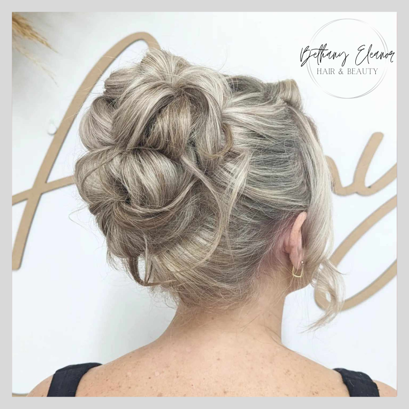 Image of bridal hair, curled and braided by Bethany Eleanor Hair & Beauty