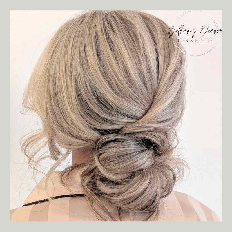 Image of bridal hair, curled and braided by Bethany Eleanor Hair & Beauty