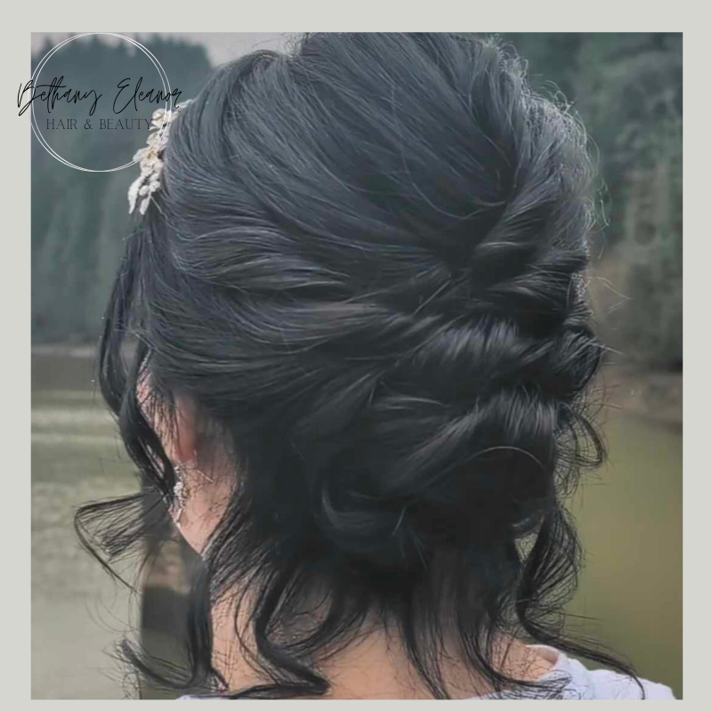 Image of bridal hair, large braided bun by Bethany Eleanor Hair & Beauty