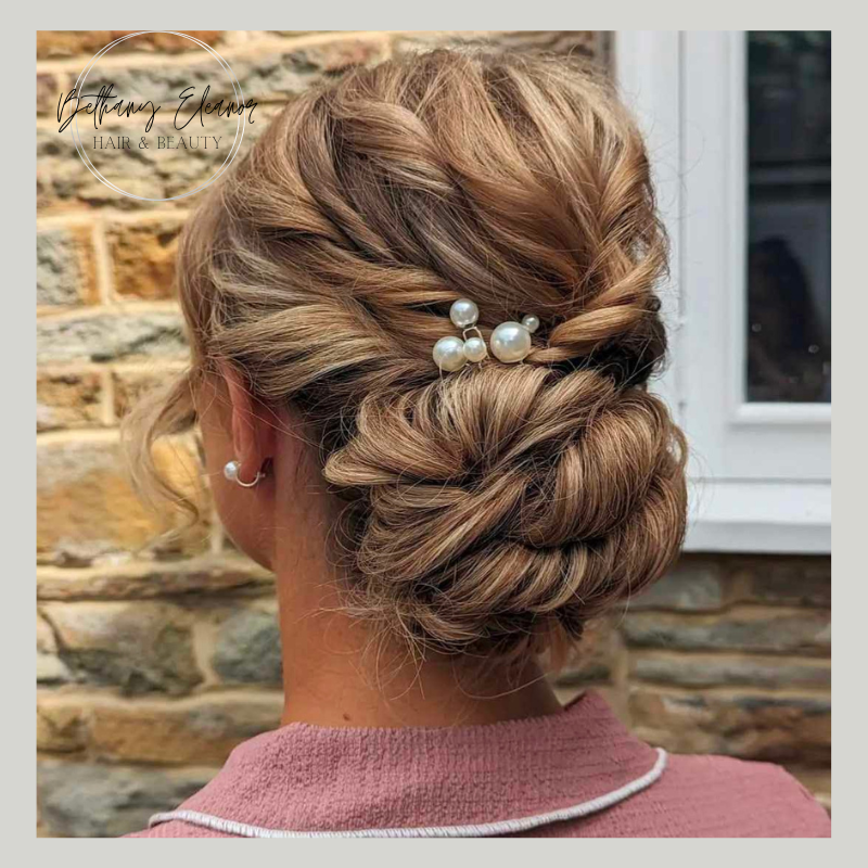 Image of bridal hair, braided plait across one side of the head by Bethany Eleanor Hair & Beauty